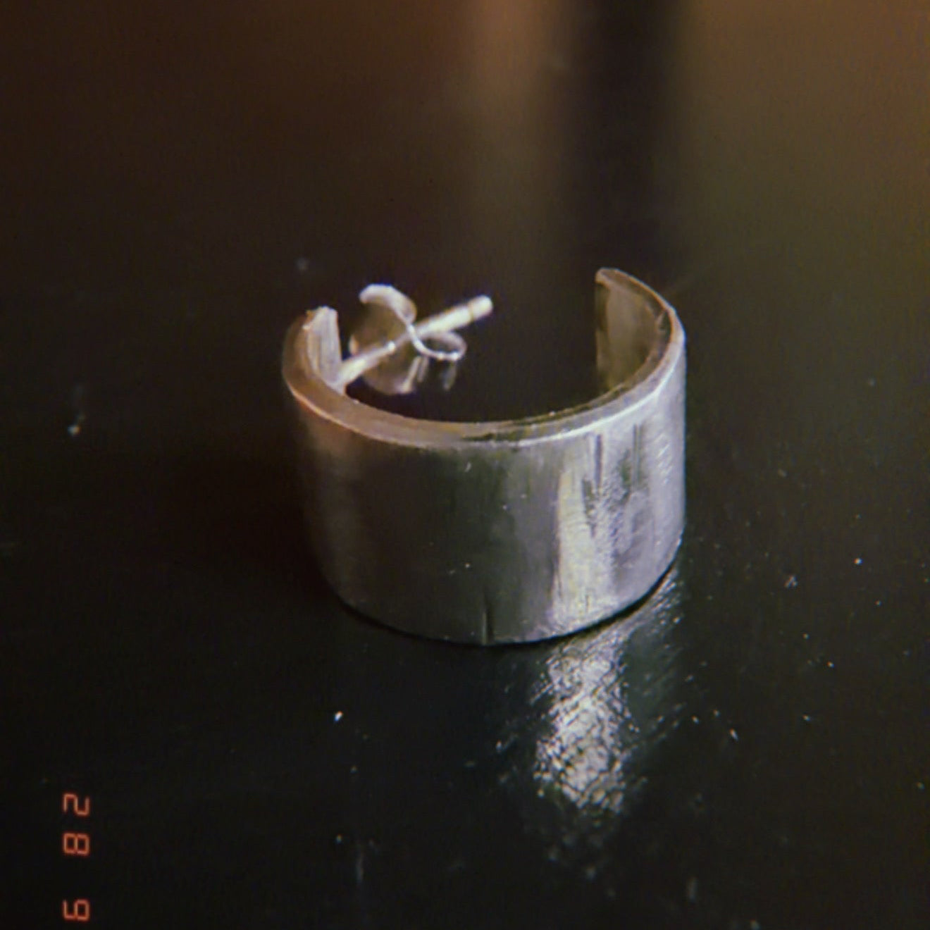 Orecchini fascia larga